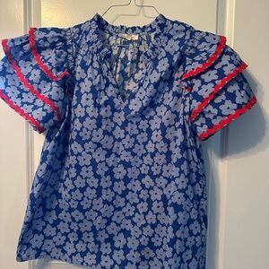 Entro top. Worn once blue with Red Rick rack. Size small.